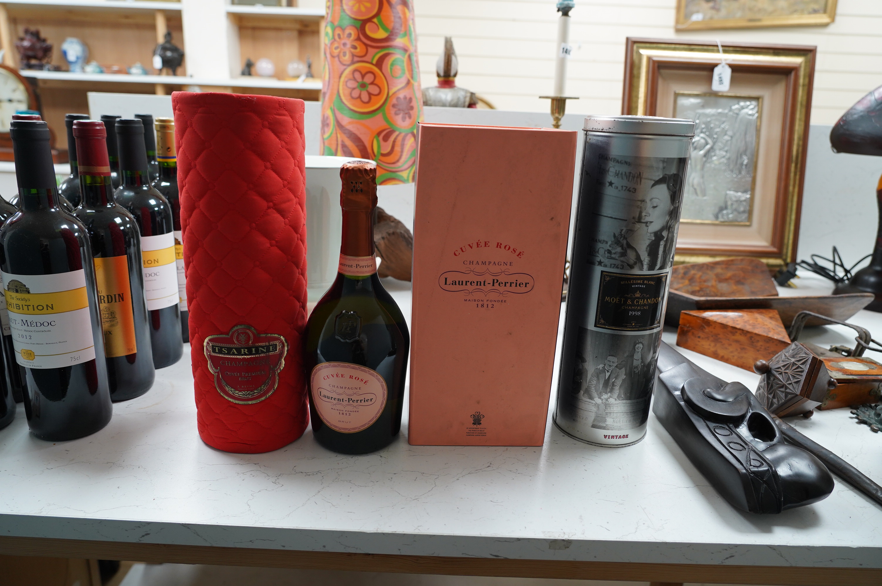 A bottle of Moet & Chandon champagne, two bottles of Laurent Perrier champagne and one other (4). Condition - fair to good